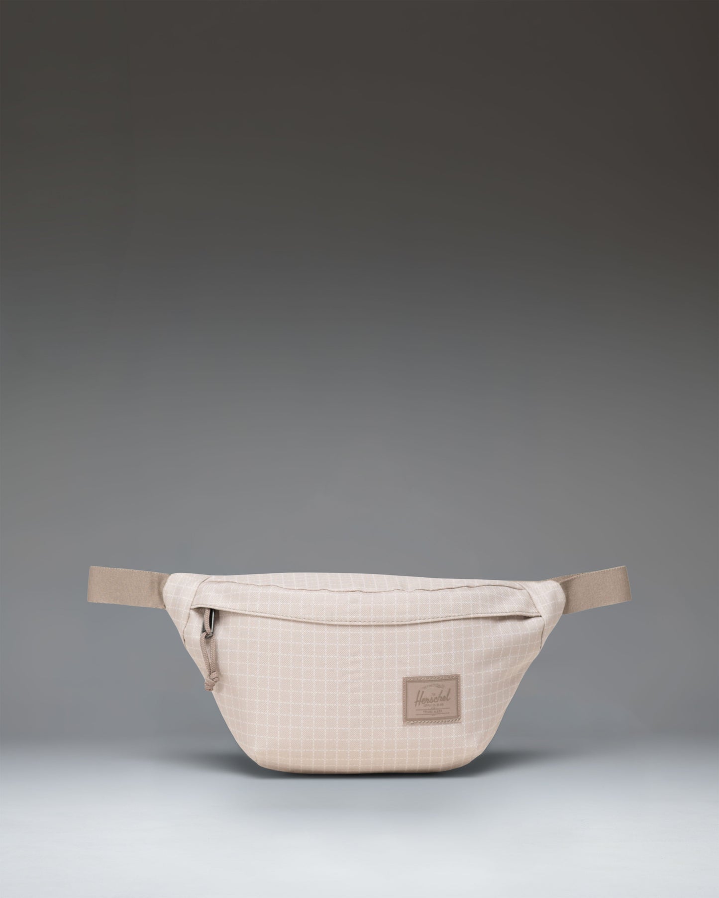 Herschel Classic Hip Pack in Grid Pelican/Roasted Cashew colorway shown from a front angle against a white background.