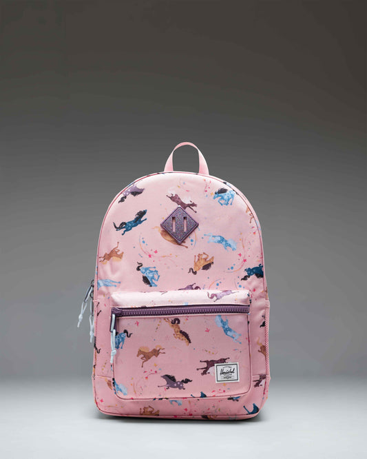 Herschel Heritage Youth Backpack in Wild Horses pink print, featuring padded shoulder straps and a front zipper pocket.