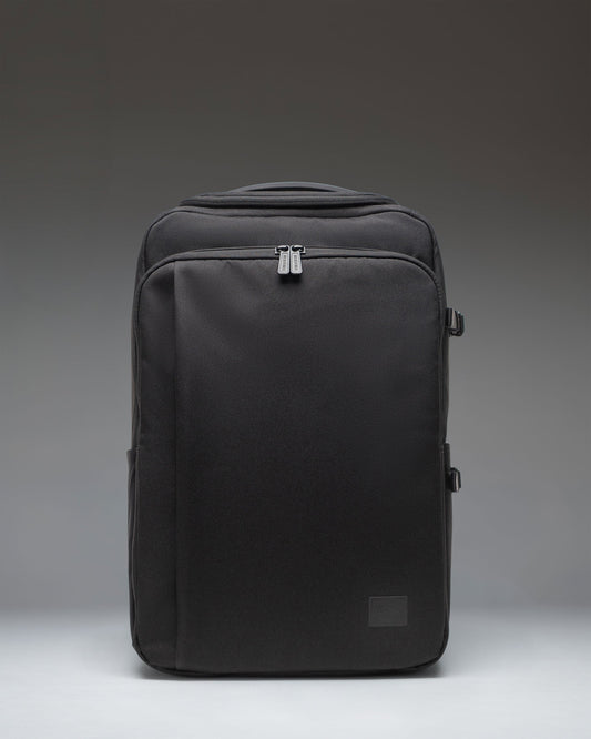 Black Herschel Supply Co. Kaslo Camera Bag Tech in black, showing the front view of the structured tech and camera crossbody bag.