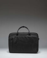 Black Herschel Supply Co. Bowen Convertible Travel Duffle Tech bag shown from the front.
