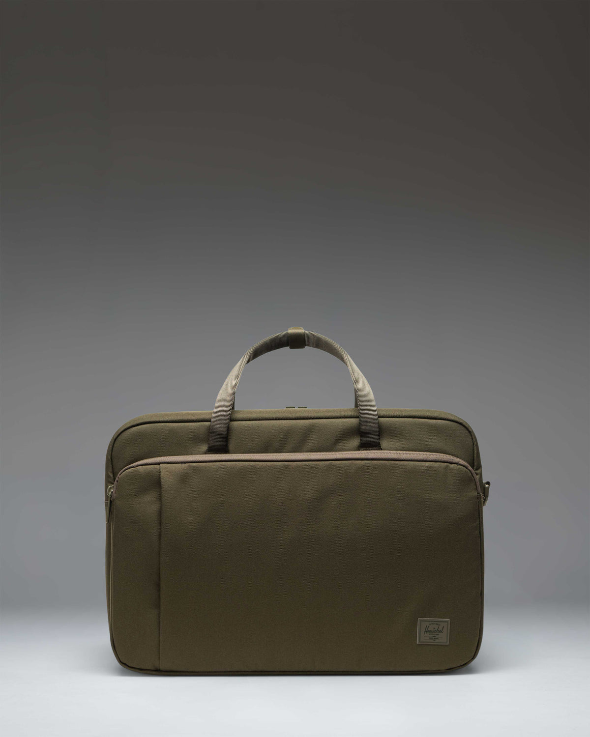 Herschel Supply Co. Bowen Convertible Travel Duffle Tech in Ivy Green Tonal, showing the front view with straps and handles.
