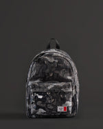 Herschel Supply Co. LEGO Classic Backpack in Abstract Bricks Black featuring a black body with a subtle tonal geometric brick pattern.