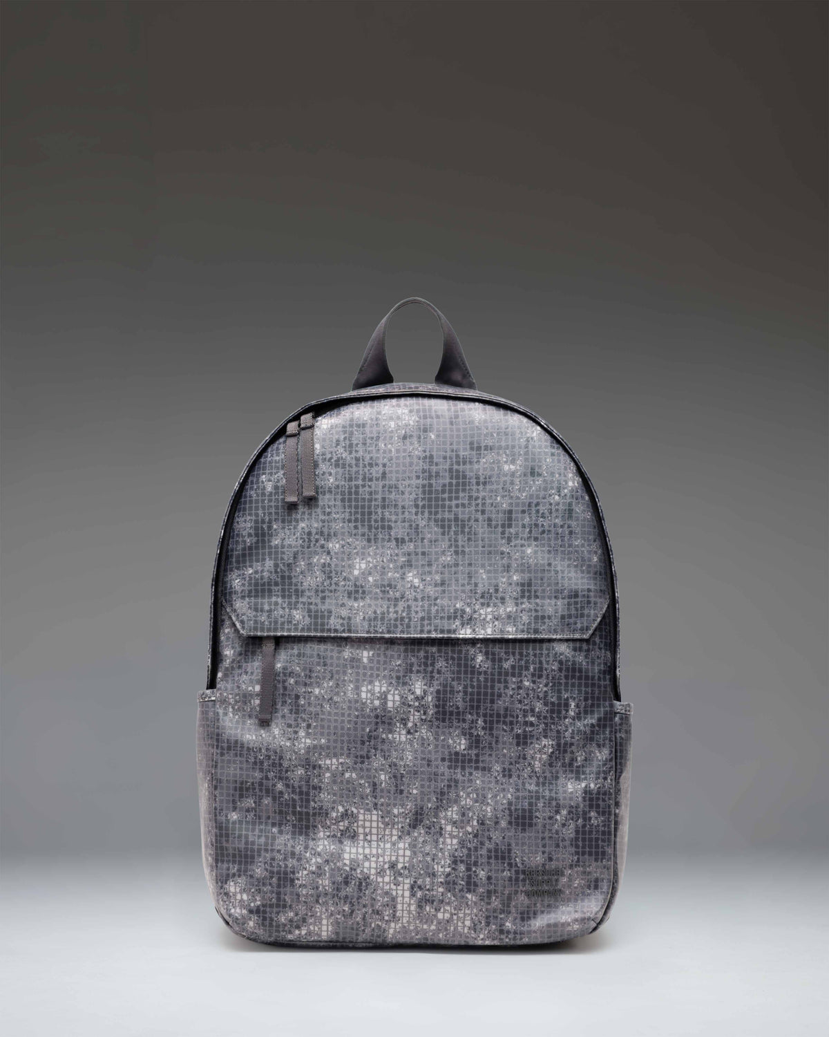 Herschel Supply Co. Alberni Backpack in Cloud Grid, featuring a grey grid pattern with a front pocket and classic logo.