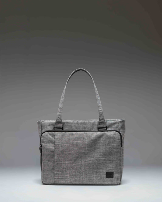 Herschel Supply Co Kaslo Tote Tech in Raven Crosshatch grey, showing the front view with dual top handles and a clean, rectangular design.