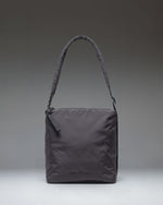Herschel Supply Co Cloudform Small Tote in black, showing the clean front design and dual top carrying handles.
