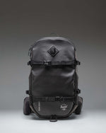 Black Herschel Supply Co. All Season Pro Backpack 36L shown from the front, highlighting its clean, functional design.