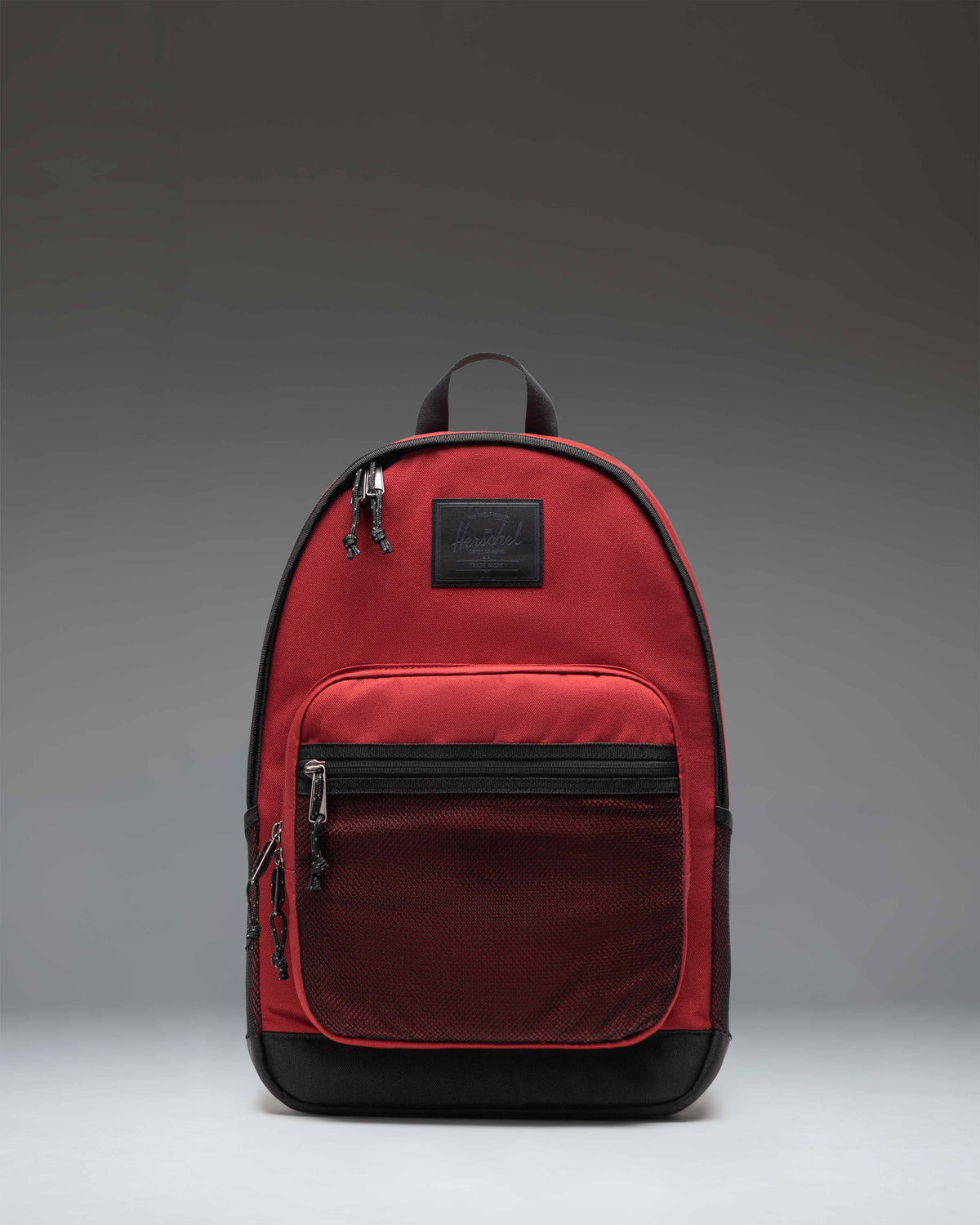 Herschel Supply Co. Kaine Backpack in Varsity Burgundy, showcasing its front design, straps, and compartments.
