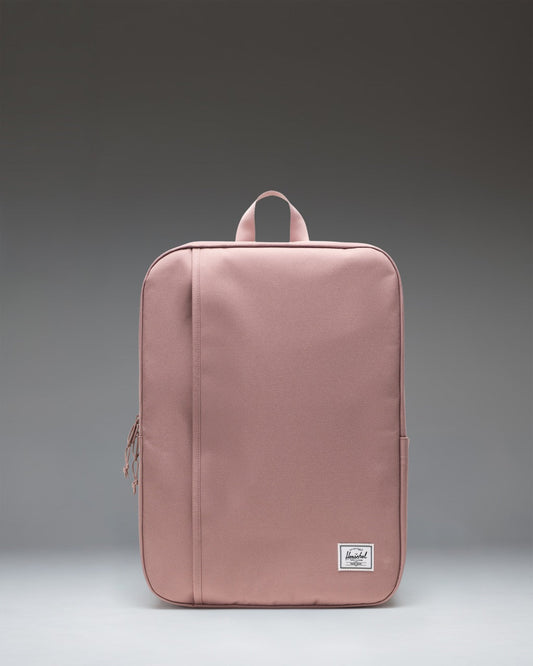 Herschel Supply Co. Wesbrook Backpack in Ash Rose, featuring a clean front view with zippered compartments and shoulder straps.