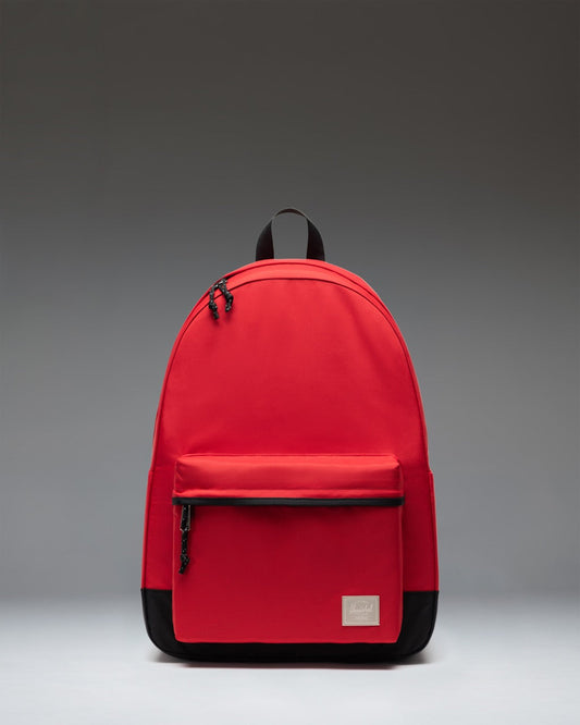 Herschel Supply Co. Classic XL Backpack in Barbados Cherry red, shown from the front highlighting the main compartment and front pocket.