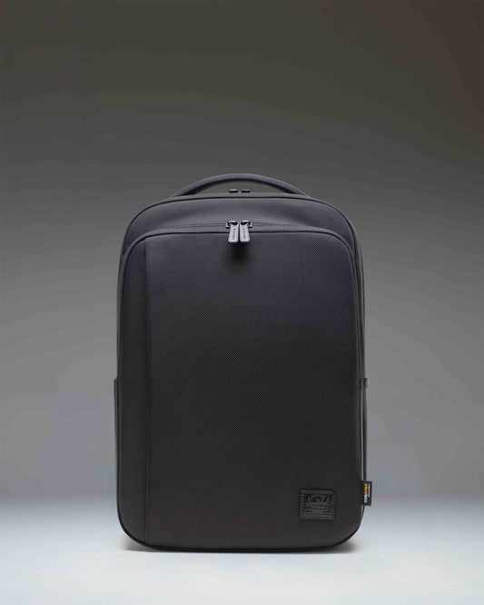 Herschel Supply Co. Kaslo Daypack Tech Cordura in black, shown from the front highlighting its clean design, zippers, and durable material.