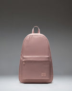 Herschel Supply Co Rome Packable Backpack in Ash Rose Tonal, shown packed down into its own internal pocket for compact storage.
