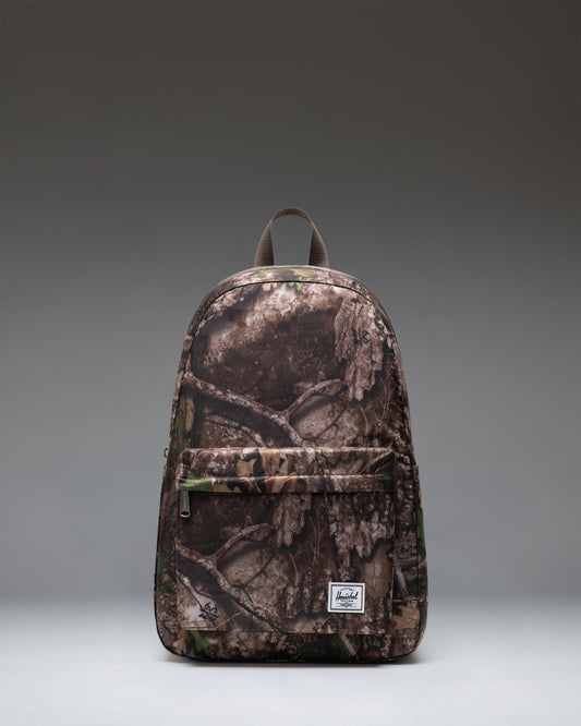 Herschel Supply Co. Realtree Rome Packable Backpack in Realtree APX Camo pattern, showing a lightweight, durable design ideal for travel.