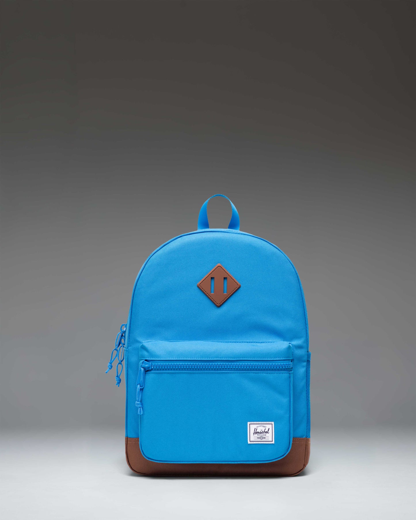 Herschel Heritage Kids Backpack in French Blue with Saddle Brown diamond accent and shoulder straps, shown from the front.