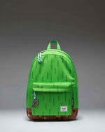 Herschel Supply Co. x Minecraft Classic Backpack in The Overworld colorway, featuring iconic pixelated block prints from the game.