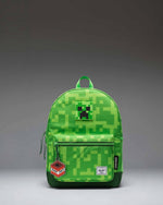 Herschel Supply Co. Minecraft Heritage Kids Backpack in the green pixelated Creeper pattern design.