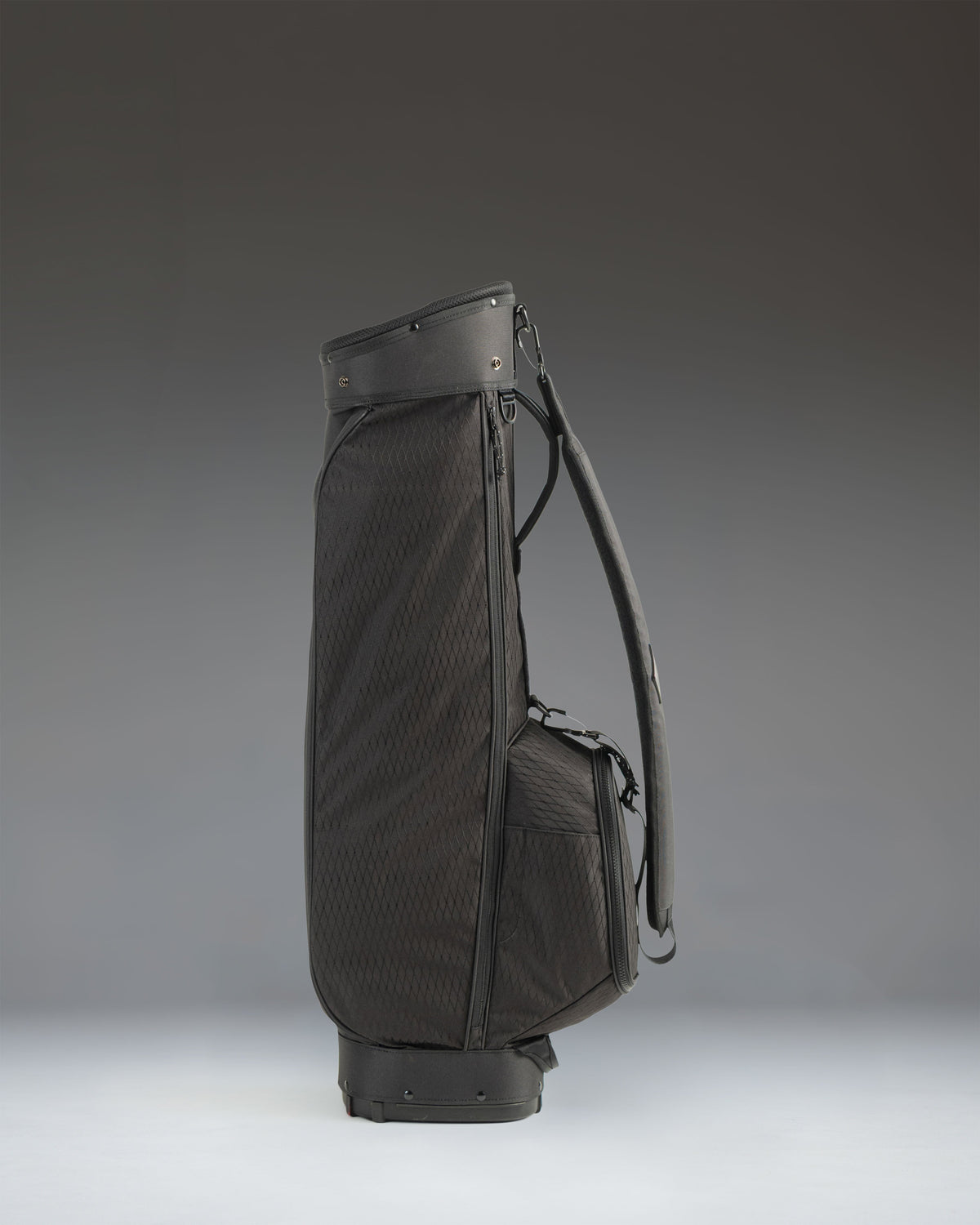 Herschel Supply Co. Herschel Watt Sunday Bag in black, featuring a sleek, minimalist golf bag design with carry straps.