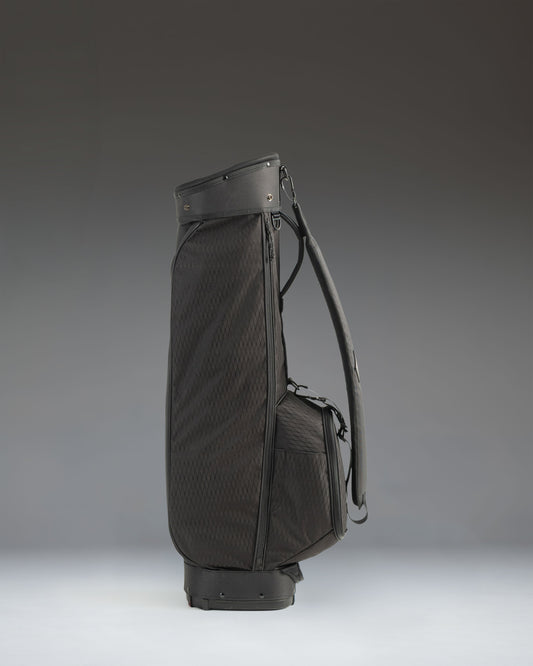 Herschel Supply Co. Herschel Watt Sunday Bag in black, featuring a sleek, minimalist golf bag design with carry straps.