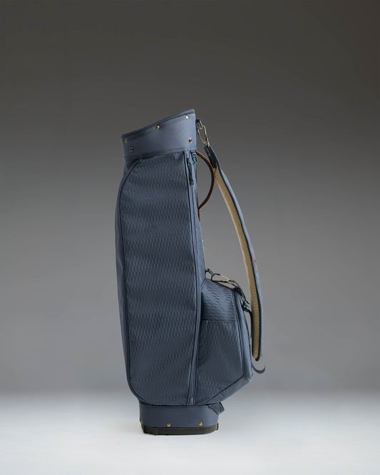Herschel Watt Sunday Bag in Navy, showing a lightweight, minimalist golf carry bag with a comfortable shoulder strap and club dividers.