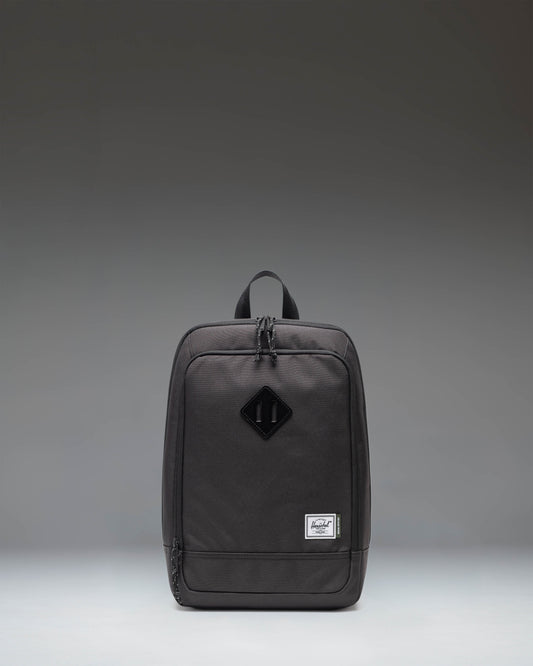Black Herschel Heritage Shoe Bag showing the front view with a handle and the classic Herschel woven label.