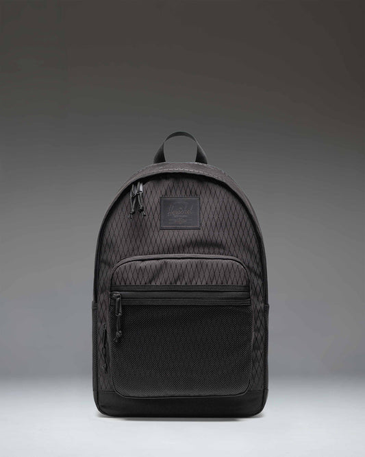 Herschel Kaine Backpack in Black Diamond/Black featuring a spacious main compartment, dual front mesh pockets, and comfortable shoulder straps.