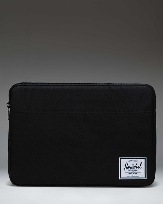 Herschel Supply Co. Anchor 15-16 Inch laptop sleeve in solid black, showing the clean front design.