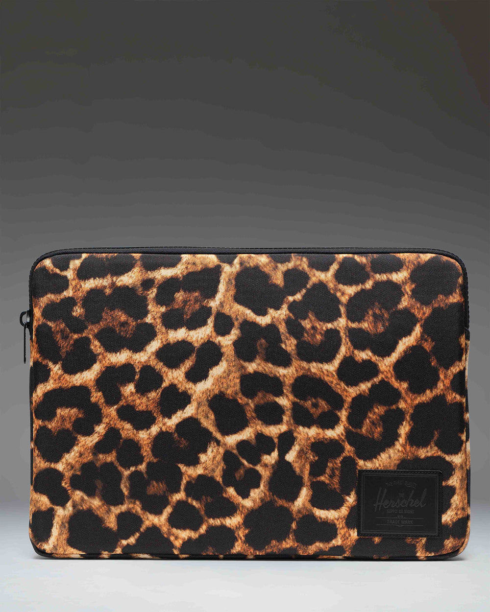 Herschel Supply Co. Anchor 15-16 Inch laptop sleeve in a light digi leopard print pattern.