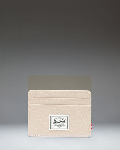 Herschel Supply Co. Charlie Cardholder in Eucalyptus green. Front view of the slim wallet showing multiple card slots and signature woven label.