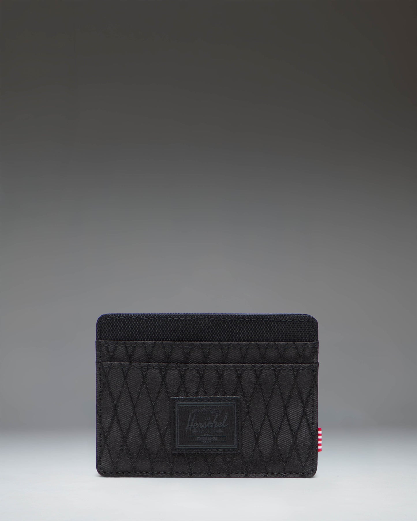 Herschel Supply Co Charlie Cardholder in Black Diamond/Black showing multiple card slots and signature striped fabric liner.