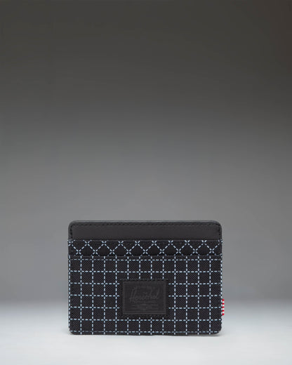 Herschel Supply Co. Charlie Cardholder in Grid Black/Black, showing the sleek, compact design with multiple card slots and a textured grid pattern.