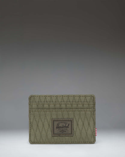 Herschel Supply Co. Charlie Cardholder in Ivy Green Diamond, featuring a compact design with multiple card slots and a textured diamond pattern.