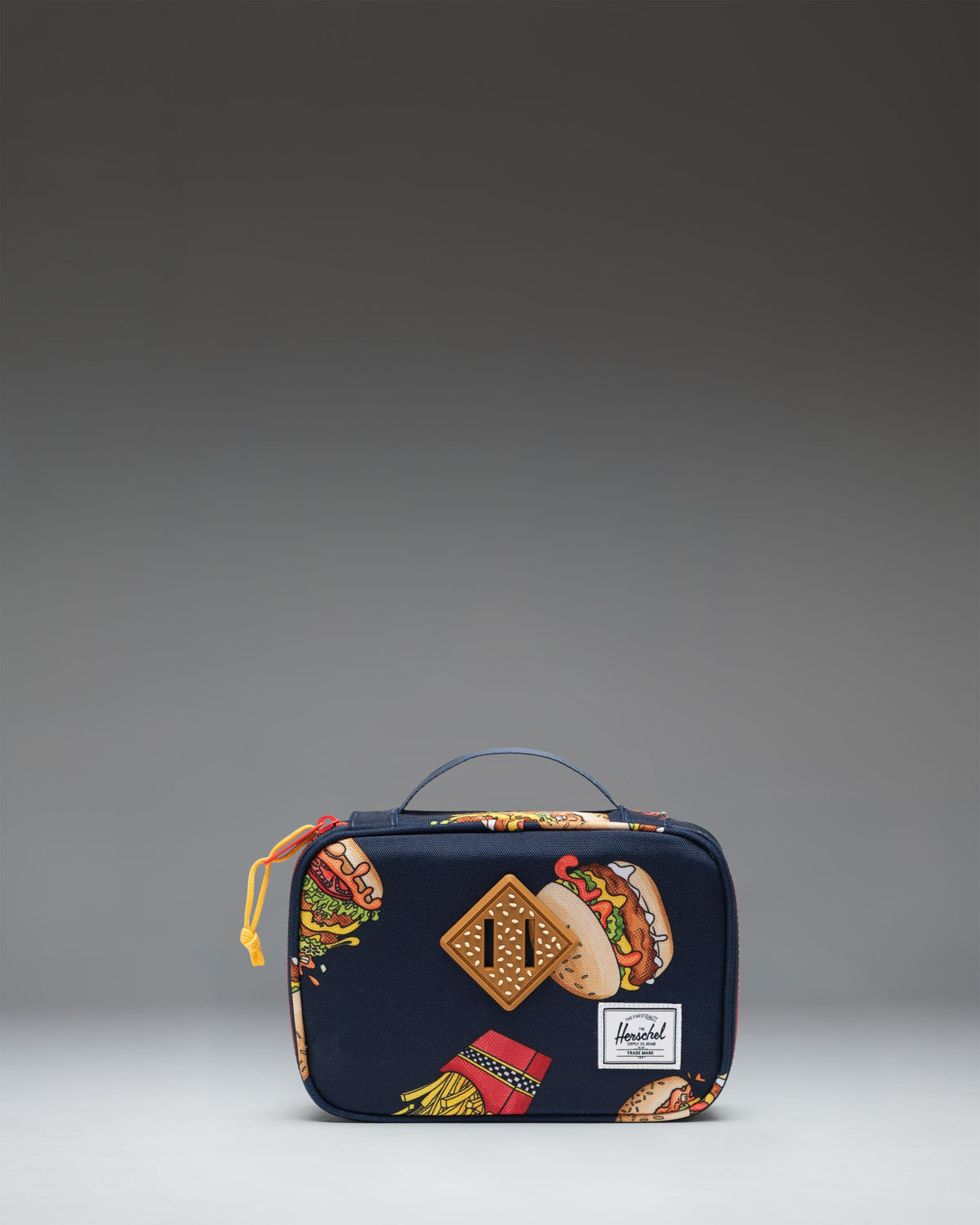 Herschel Supply Co Little Herschel Heritage Pencil Case in 19-3921TCX/17-1558TCX color showing the front view.