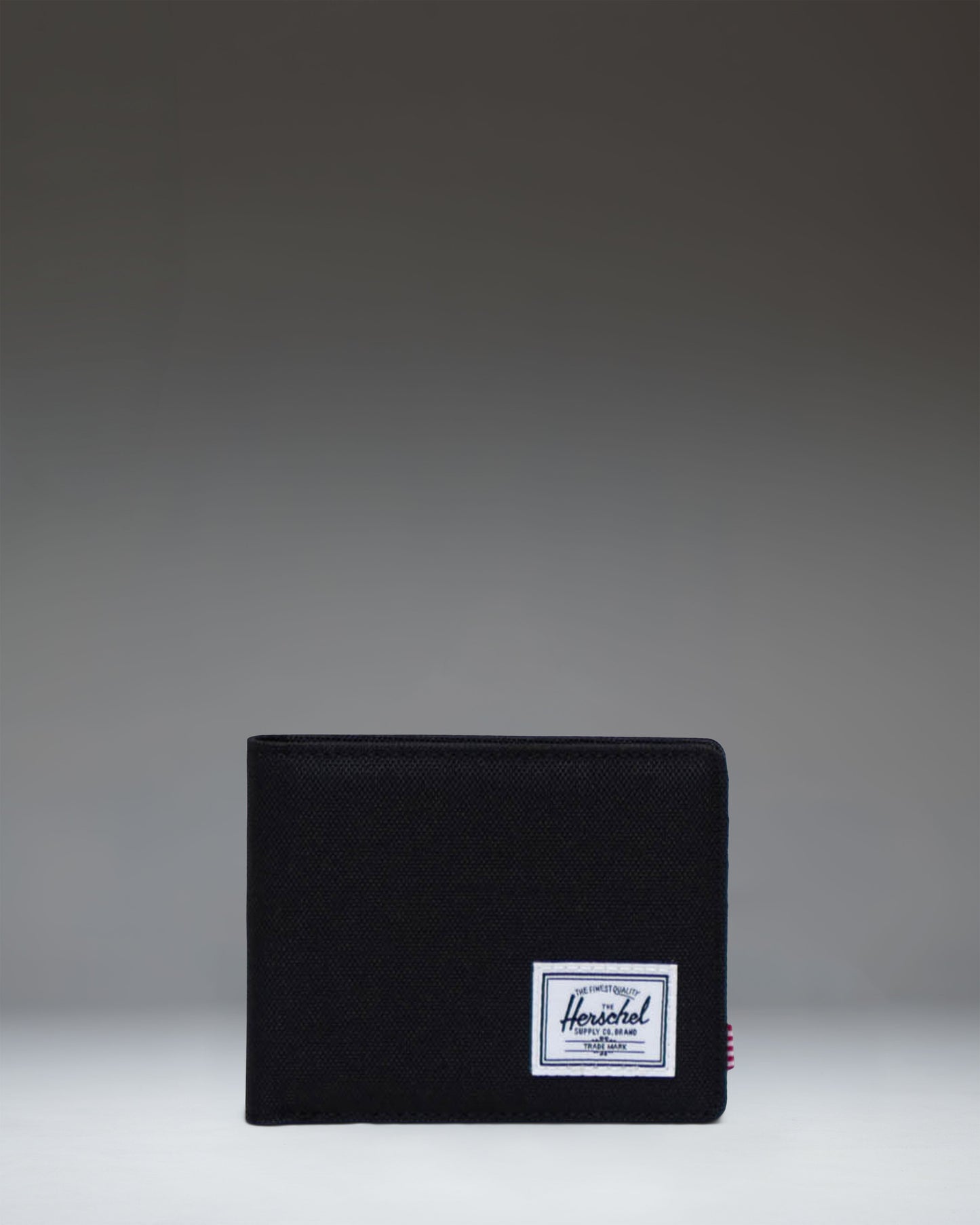 Herschel Supply Co. Roy Wallet in black, featuring a classic bi-fold design.