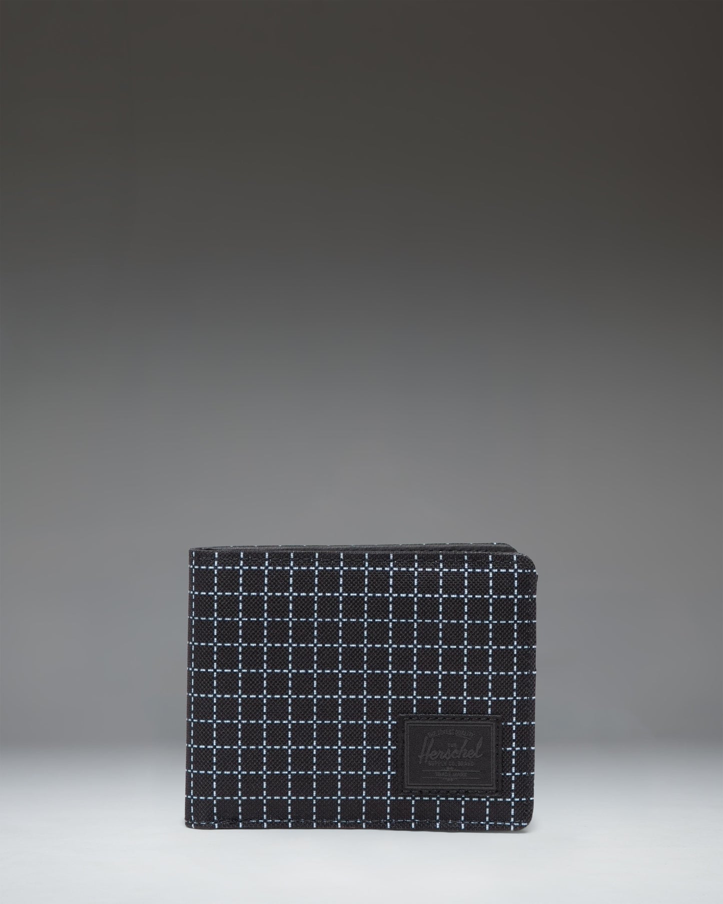 Herschel Supply Co. Roy Wallet in Grid Black/Black, a classic bi-fold wallet featuring a subtle grid pattern design.