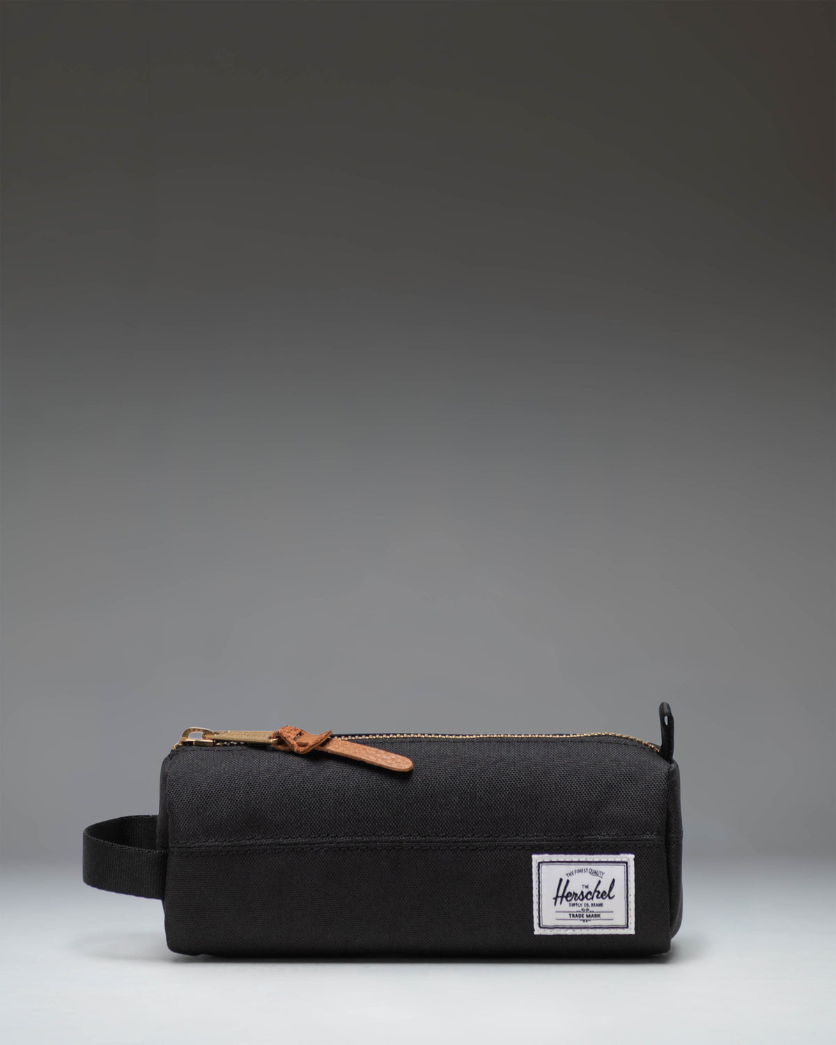 Herschel Supply Co. Settlement Pencil Case in classic black, featuring a zippered closure and a clean, minimalist design.