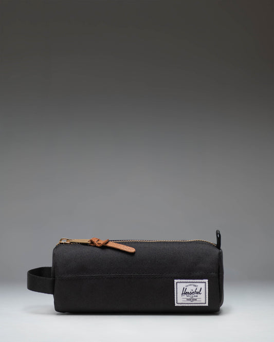 Herschel Supply Co. Settlement Pencil Case in classic black, featuring a zippered closure and a clean, minimalist design.