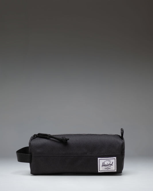 Herschel Supply Co. Settlement Pencil Case Little Herschel in black, showing the classic zippered pouch design.