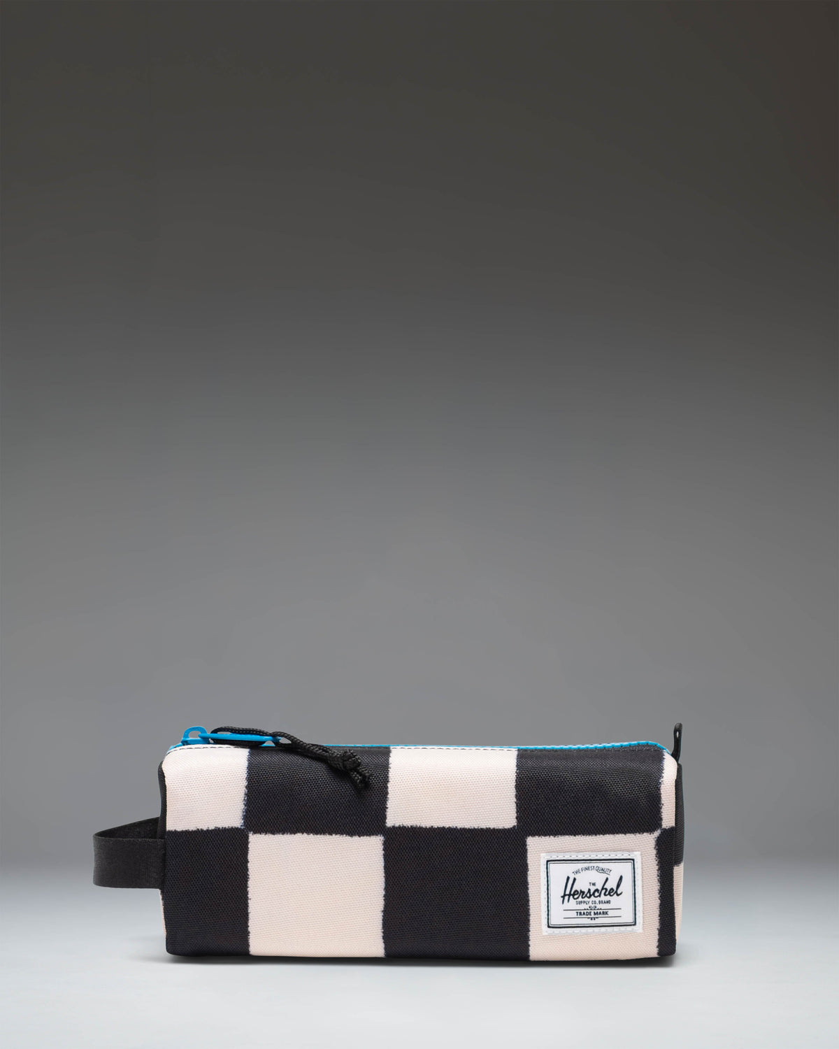 Herschel Supply Co. Settlement Pencil Case Little Herschel in Check This Hawaiian Surf pattern, featuring a blue and white checkered design.