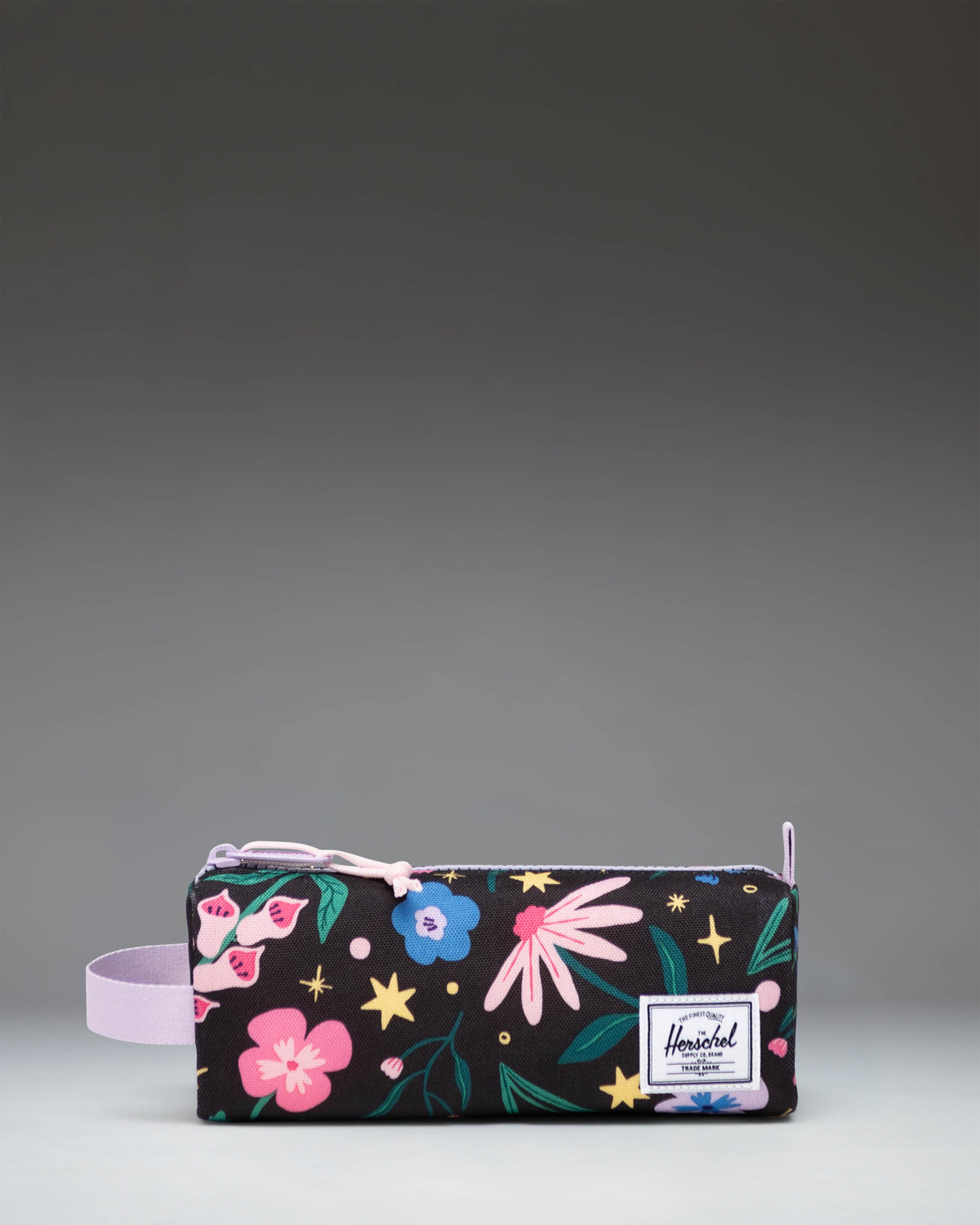 Little Herschel Settlement Pencil Case in the Enchanted Garden floral print, featuring a classic zippered design.