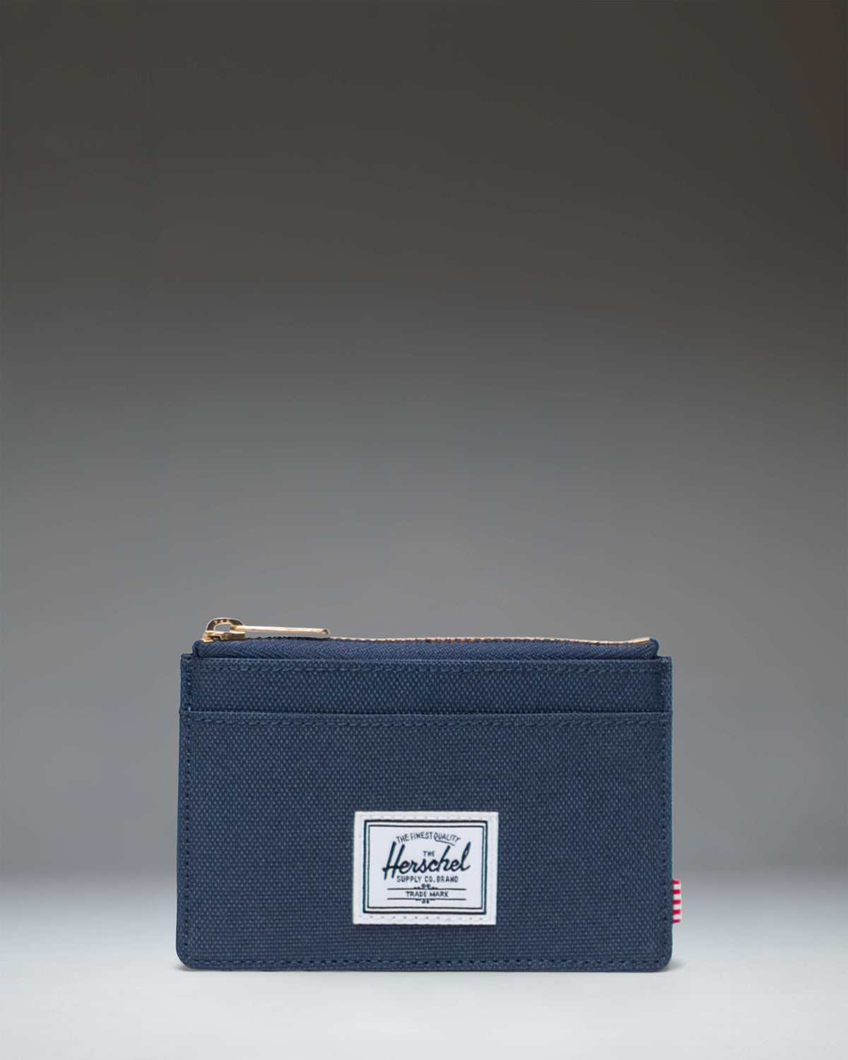 Herschel Supply Co. Oscar Cardholder wallet in navy blue.