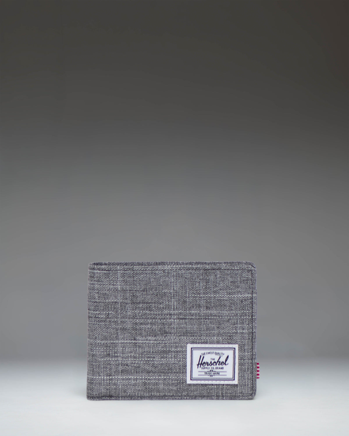 Herschel Supply Co Roy Coin Wallet in Raven Crosshatch, front view.
