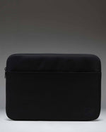 Herschel Supply Co. Denman 15-16 Inch Sleeve Tech in black, showing the sleek, minimalist laptop case design.