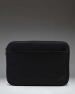 Black Herschel Supply Co. Denman 14-inch tech sleeve shown from the front against a white background.
