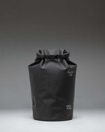 Black Herschel Supply Co. Dry Bag Organizer 15L waterproof storage bag.