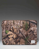 Herschel Supply Co. Realtree Anchor 15-16 Inch Sleeve in Realtree APX Camo.