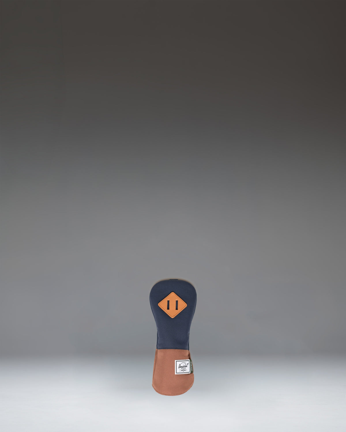 Herschel Heritage Hybrid Head Cover in Navy and Saddle Brown, showing a classic golf club cover design.