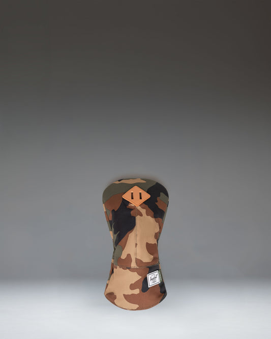 Herschel Heritage Driver Head Cover in Woodland Camo, featuring a classic camouflage pattern and signature diamond detail.