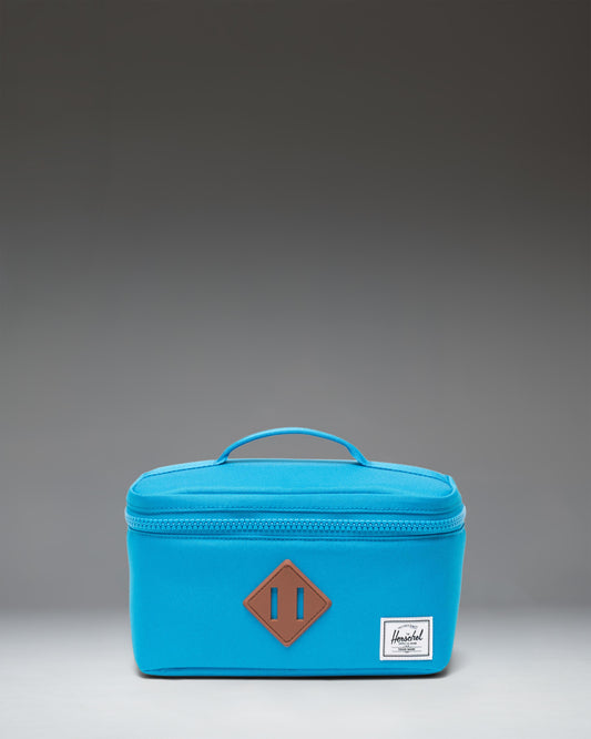 Herschel Heritage Lunch Box Little Herschel in Hawaiian Surf blue, featuring a classic structured design with a convenient front pocket.