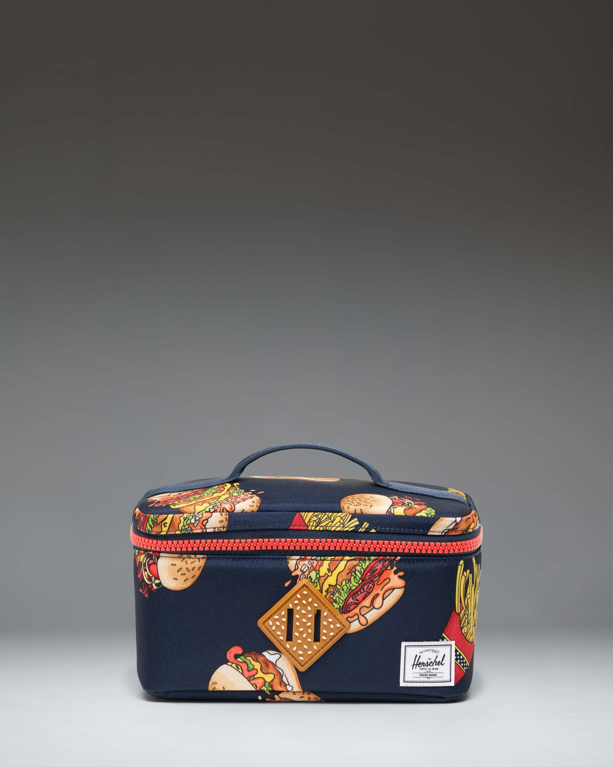 Herschel Heritage Lunch Box Little Herschel in block colors. 5.25 inches high, 9.5 inches wide, 5.75 inches deep, and 4.5 liters volume.