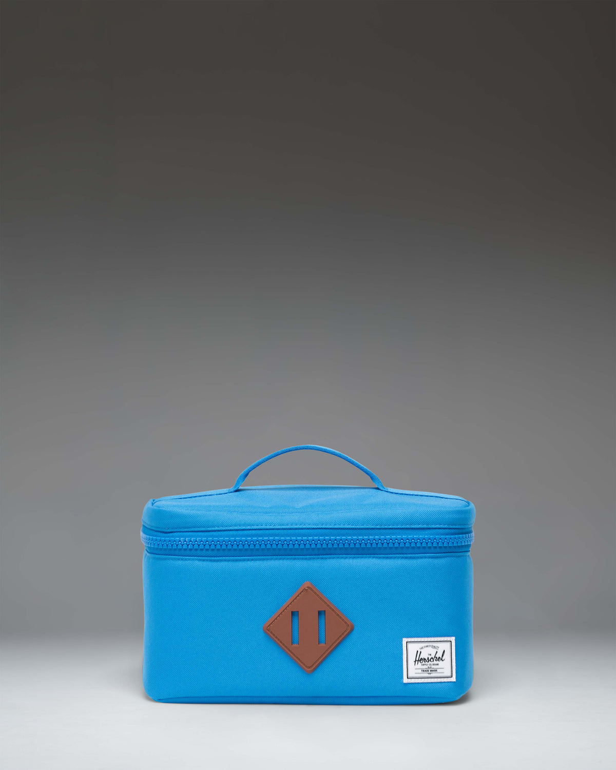 Herschel Heritage Lunch Box Little Herschel in French Blue featuring a classic rectangular insulated design with a front zippered pocket.