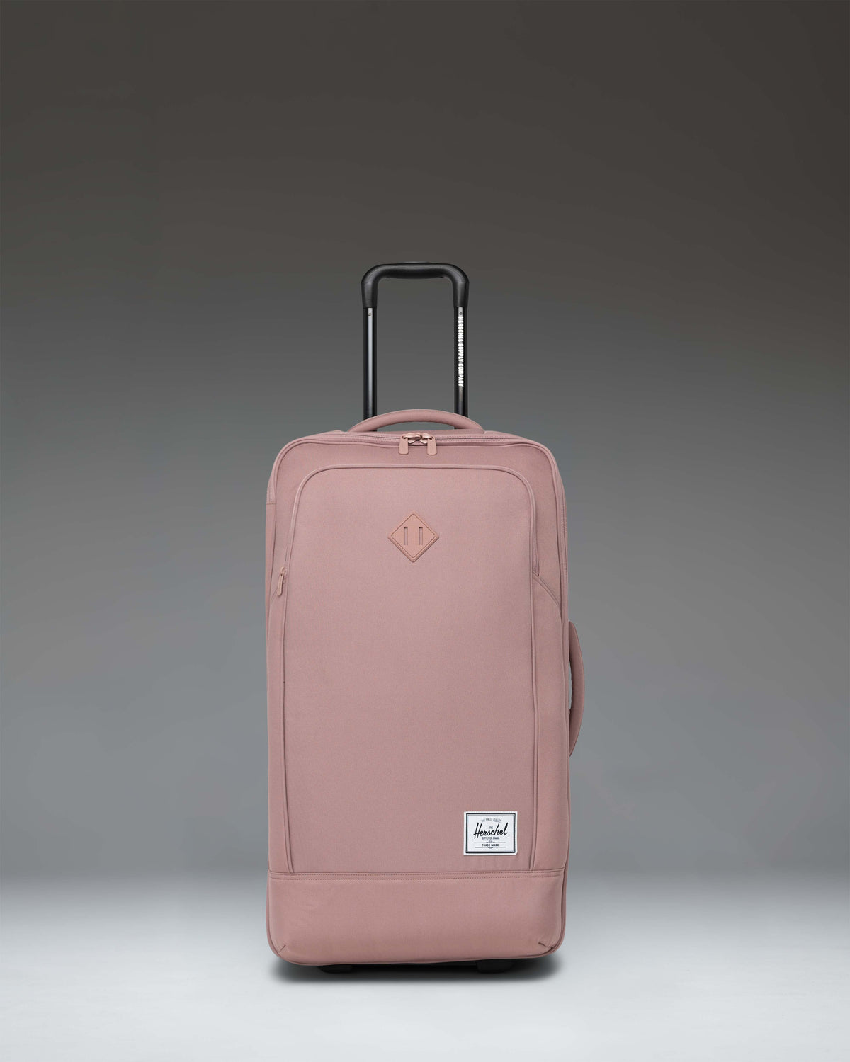 Herschel Heritage Softshell Medium Luggage in Ash Rose, front view.